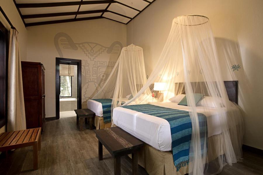 Hotel Jungle Lodge Tikal Esterno foto